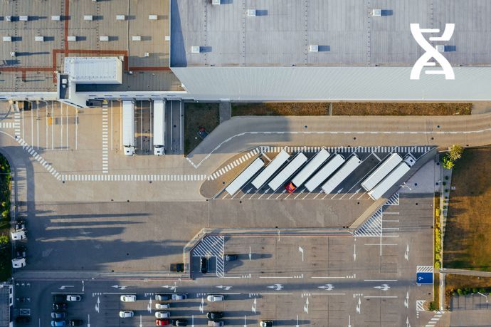 Le TMS chargeur et le WMS coopèrent au sein de l'entrepôt.